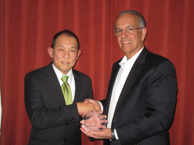 SeckLeong Lee of Albemarle and Jo Portela of CB&I accept the Kirkpatrick Chemical Engineering Award at a ceremony in New York City.